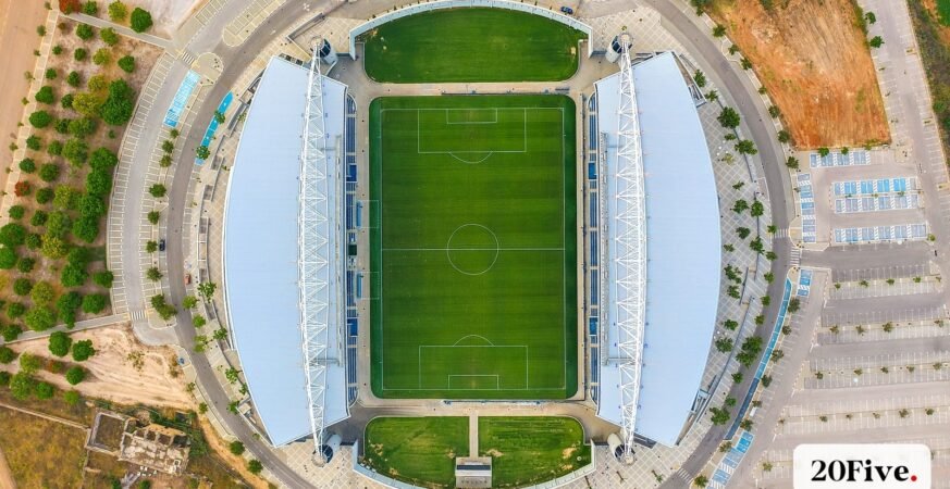 A bright aerial stadium view illustrating the reported search for Aramco Stadium investors