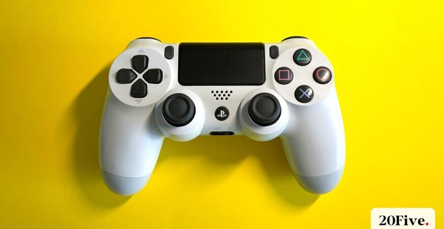 A white game controller on a bright yellow background representing the PIF Electronic Arts deal